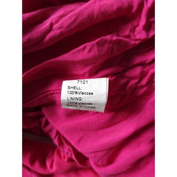 Pink sleeveless halterneck dress with ruffle hem and bow at back, viscose. - Picture 3 of 7